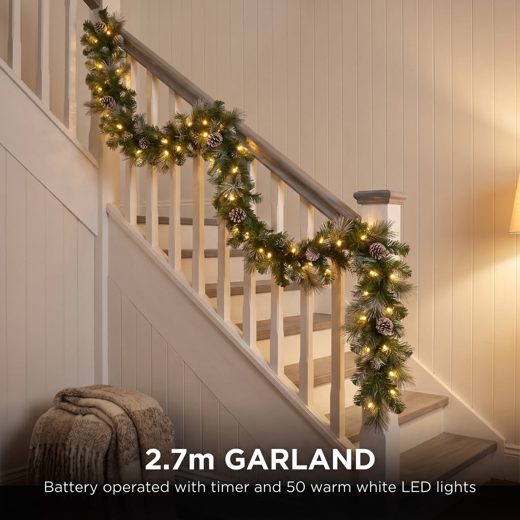 Christabelle Pre-Lit Bayville Pine Christmas Wreath 61cm or Garland 2.7m with 50 LED Lights, Pine Cones & Timer