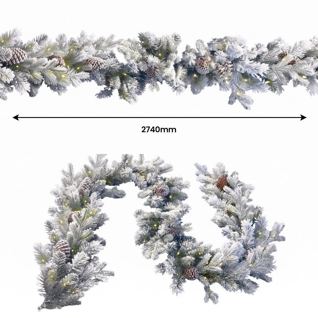 Christabelle Snowy Dorchester Pre-Lit Christmas Tree 9ft 2.7m, Flocked LED Wreath 1.2m or Garland with Pine Cones