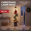 Christabelle 1.52m Lamp Post Christmas Light Up Display Bows Berries Baubles Green Foliage LED Pre Decorated