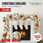 Christabelle 2.74m Snowy Elegance Christmas Garland Pre Lit Warm White LED Red Baubles Berries Flocked Mantel Banister