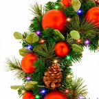 Christabelle 61cm Sable Fir Christmas Wreath Pre Lit Multi Function LED Eucalyptus Pine Cones Red Baubles Home